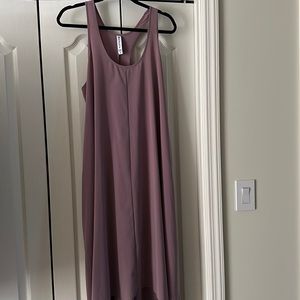 New without tags. Size Medium Bought for daughter but too long.